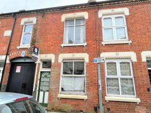 Terraced house sells for nine times the guide price at auction