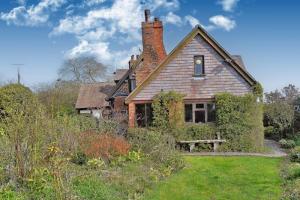 Detached cottage with medieval barn and views of Malvern Hills being auctioned